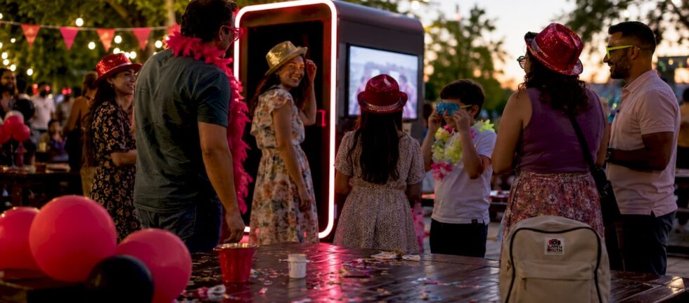 Guests engaging with photo booth at event