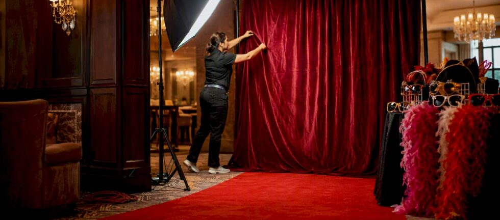 Red carpet photo booth setup at gala event